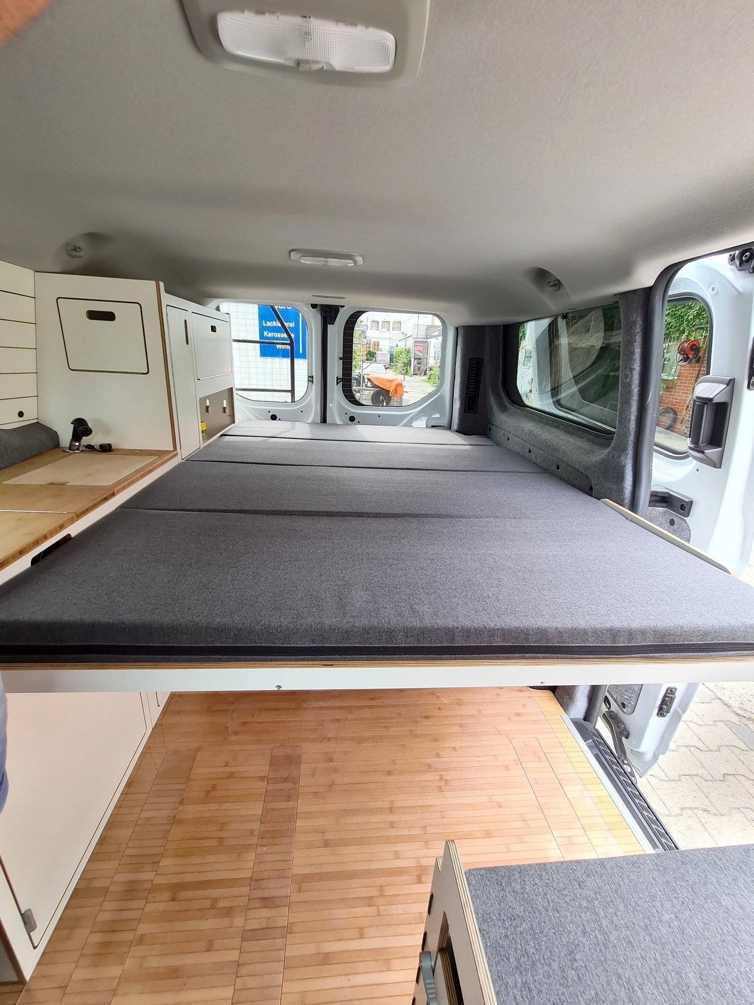 Couchages Ford Transit Custom 2,0  136PS - Yescapa