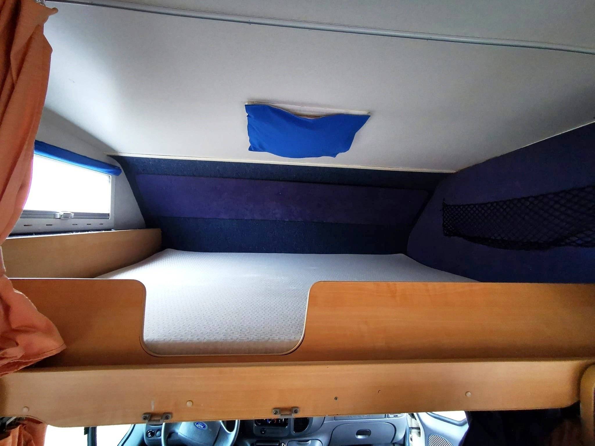 Couchages Ford Transit 2.4L 125ch - Yescapa