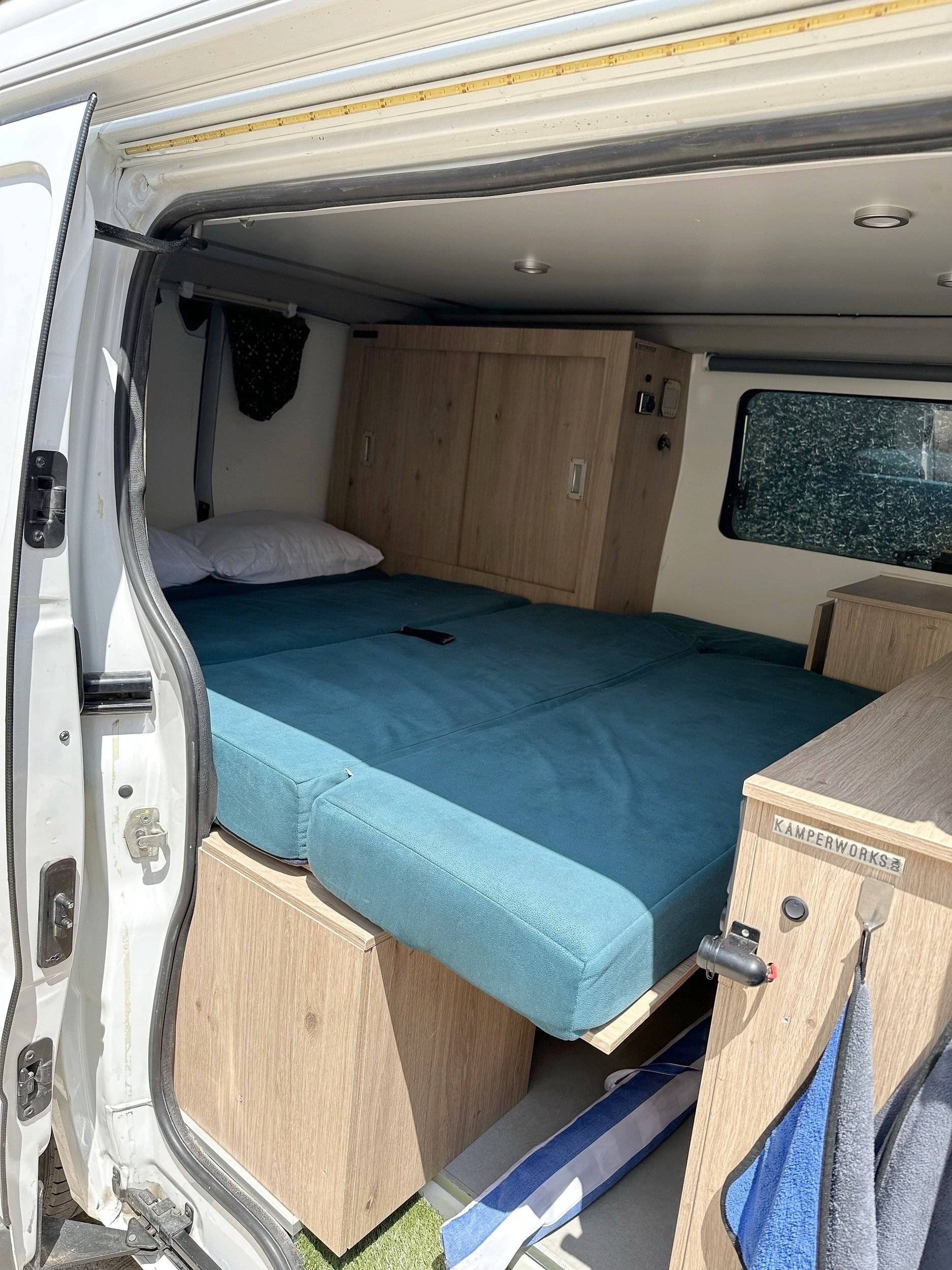 Couchages Nissan Primastar - Yescapa