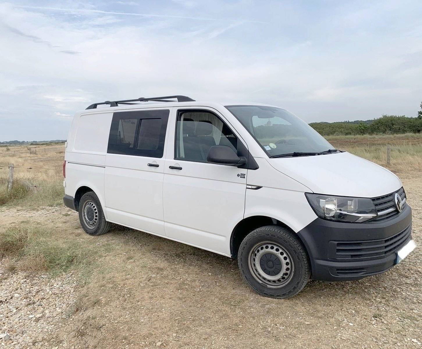 Voorkant 3/4 Volkswagen Transporter T6 L1H1 2 l 150 ch - Yescapa
