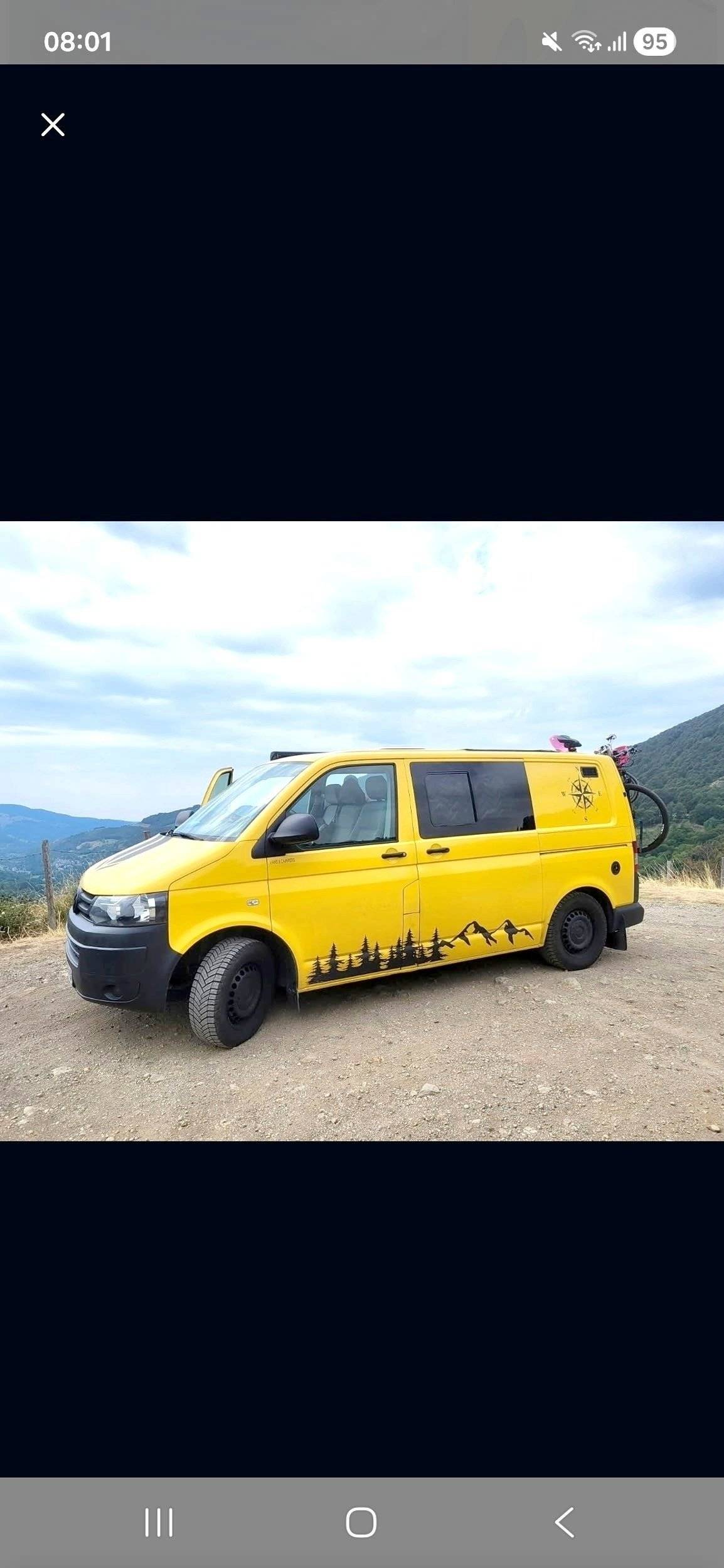Vue avant de 3/4 Volkswagen T5 2 l 84 ch - Yescapa