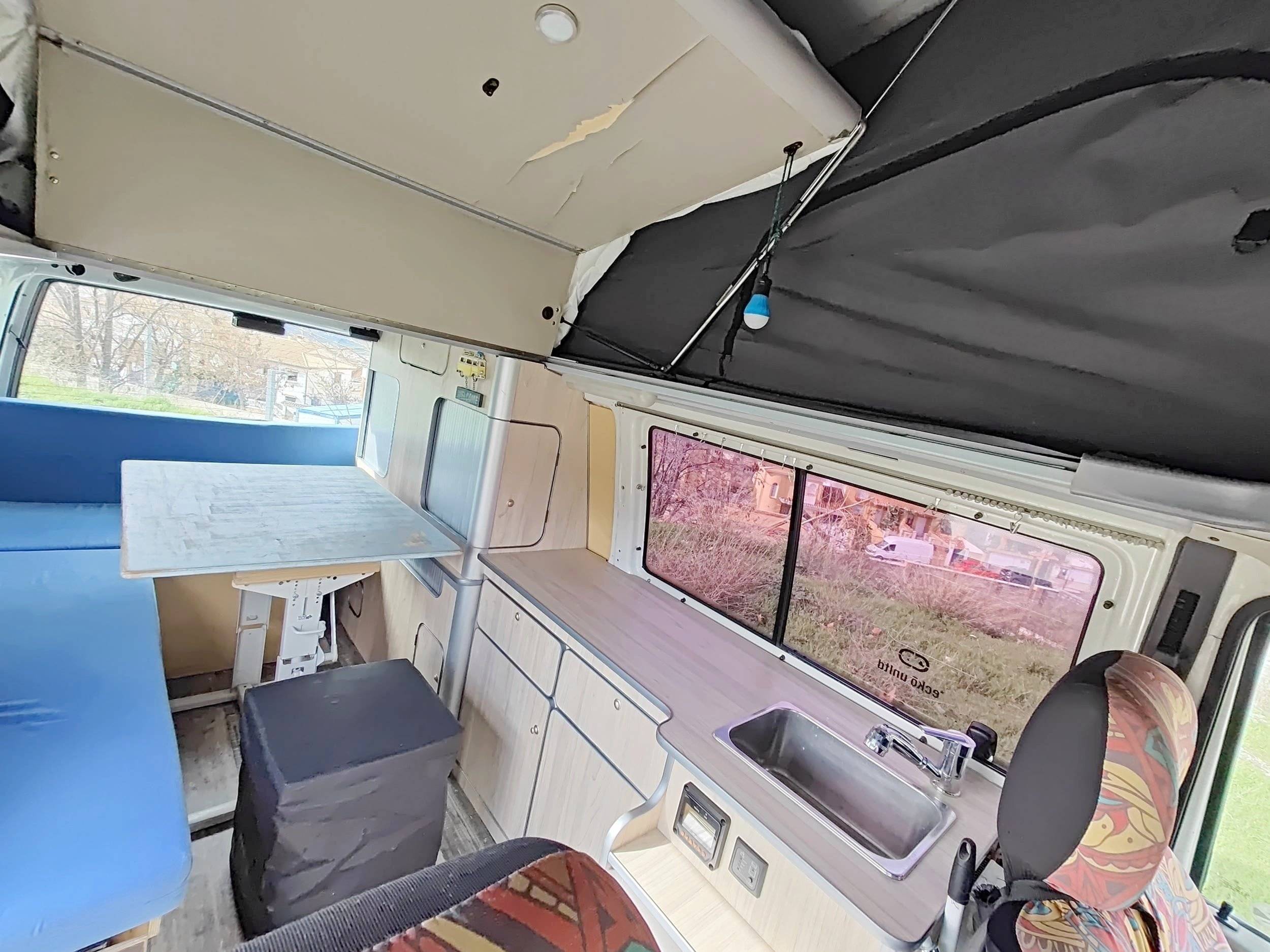 Dinette Volkswagen Volkswagen T4 2.5 TDI 102 CV - Yescapa