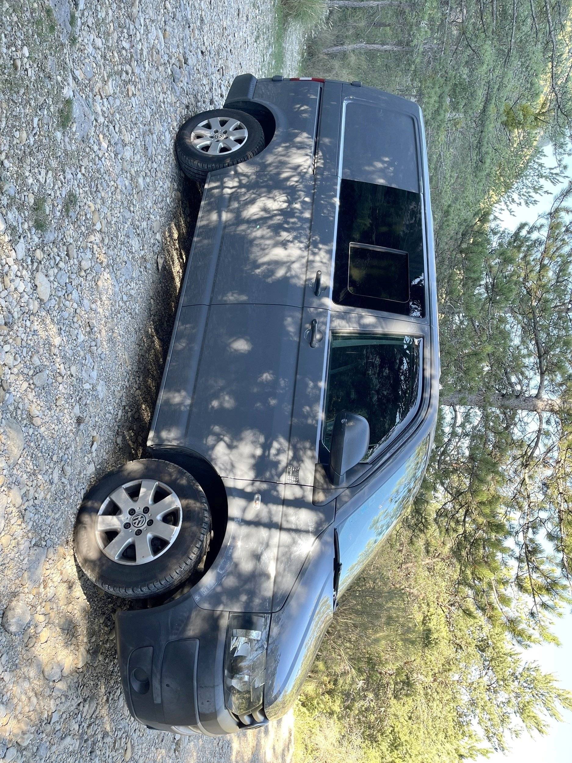 Vista frontale a ¾ Volkswagen Volkswagen T5 transporter - Yescapa