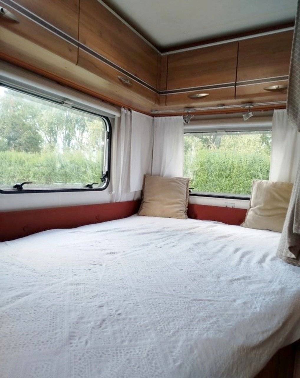Plazas en cama Ford - Yescapa